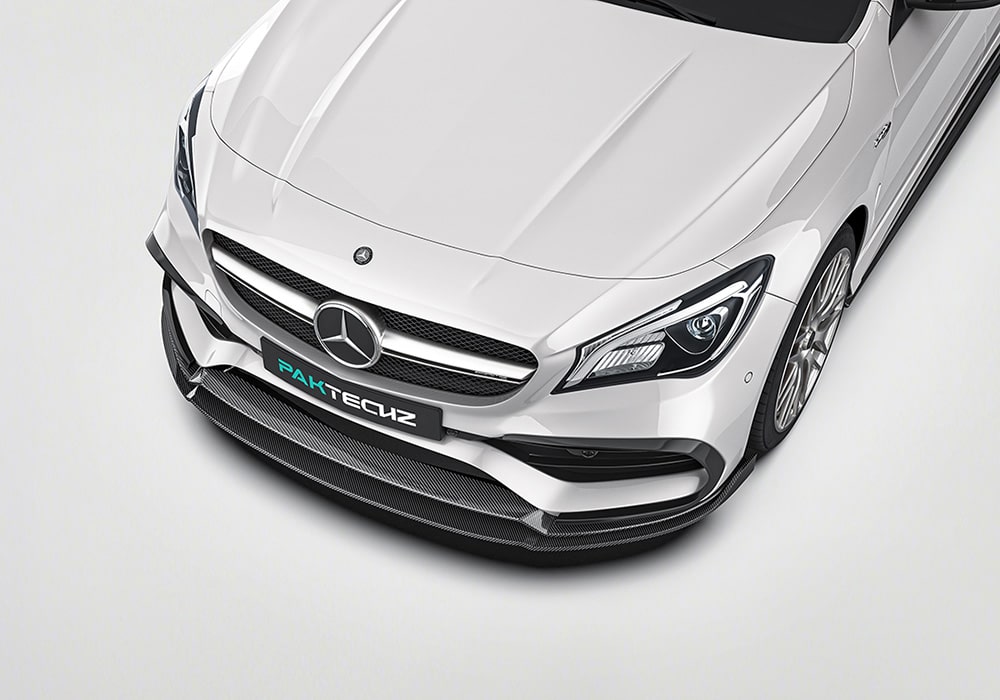 A complete body shot of the Mercedes Benz CLA-Class W117, fully equipped with the aerodynamics kit, highlighting the seamless integration of the front lip, side skirts, rear diffuser, and rear spoiler