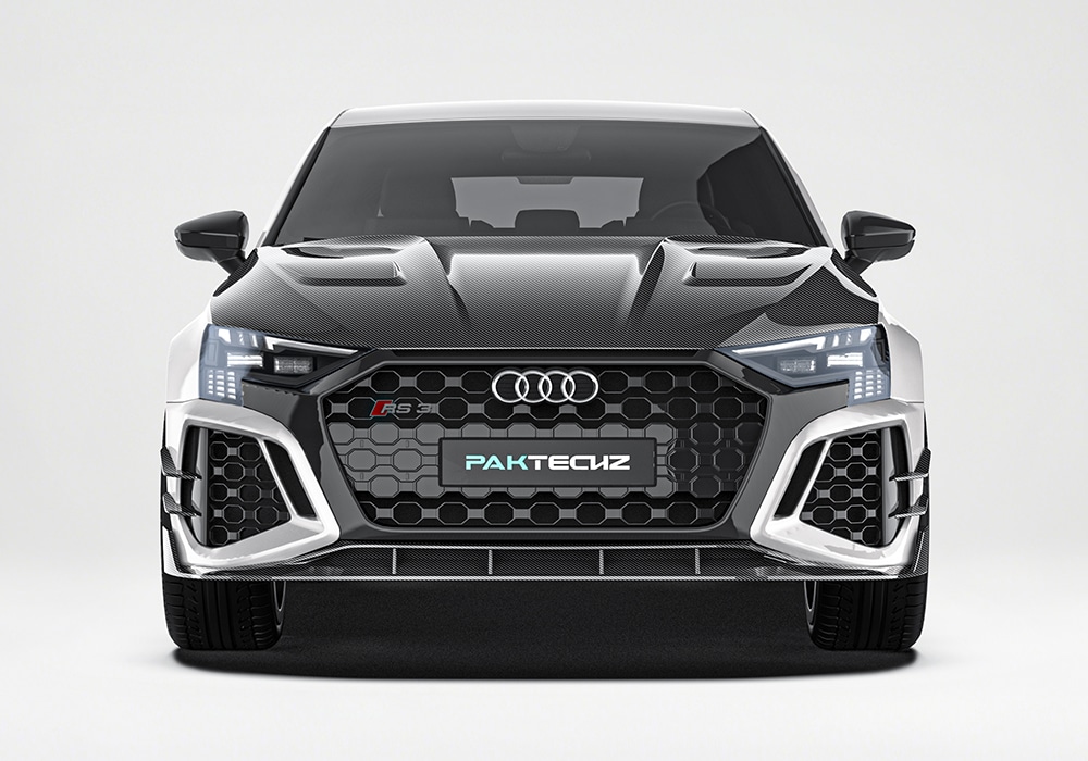 Audi RS3 (8Y) fitted with the carbon fiber aerodynamic body kit, including front splitter, side skirts, rear diffuser, and trunk spoiler
