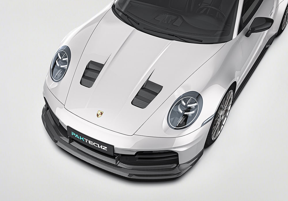 A complete front-end shot highlighting the dynamic profile of the Carbon Fiber Aero Kit, seamlessly complementing the sleek Porsche 911 design with aerodynamic precision.