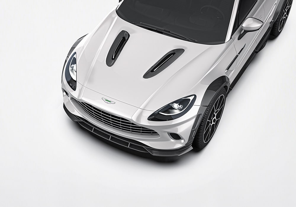 The Aston Martin DBX featuring the installed aerodynamic carbon fiber front splitter and stunning visual upgrades