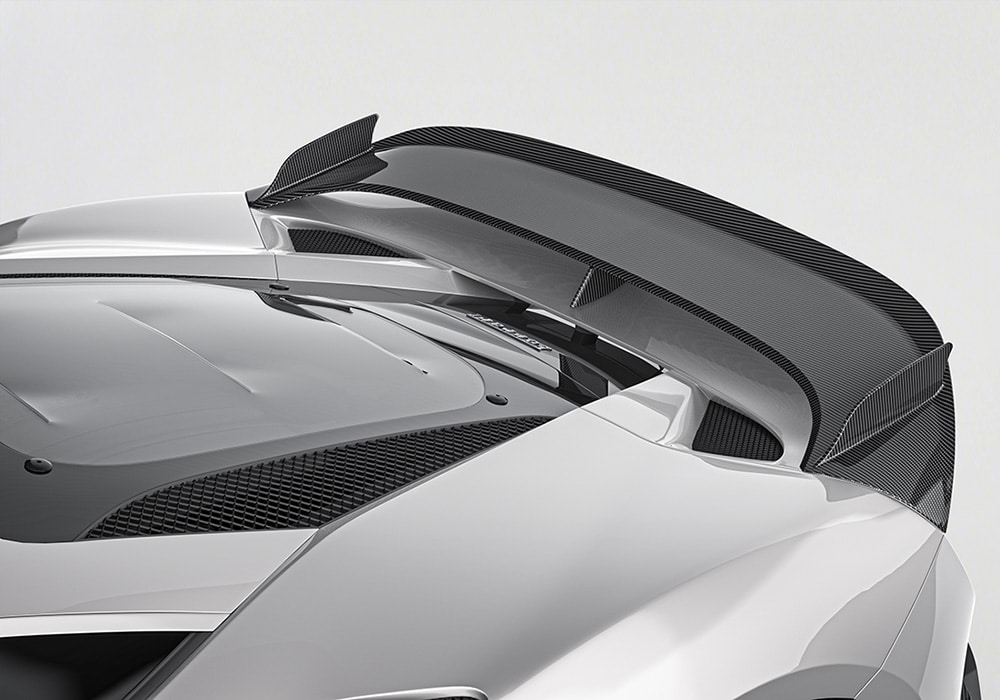 A Ferrari F8 featuring the complete carbon fiber aerodynamics kit, including front splitter, side skirts, diffuser, and rear spoiler