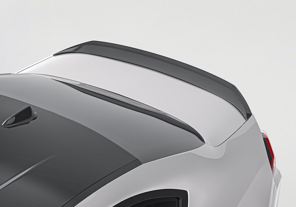 BMW M2 G87 fully equipped with the Carbon Fiber Aerodynamic Body Kit, highlighting the front splitters, side skirts, spoiler, and rear diffuser