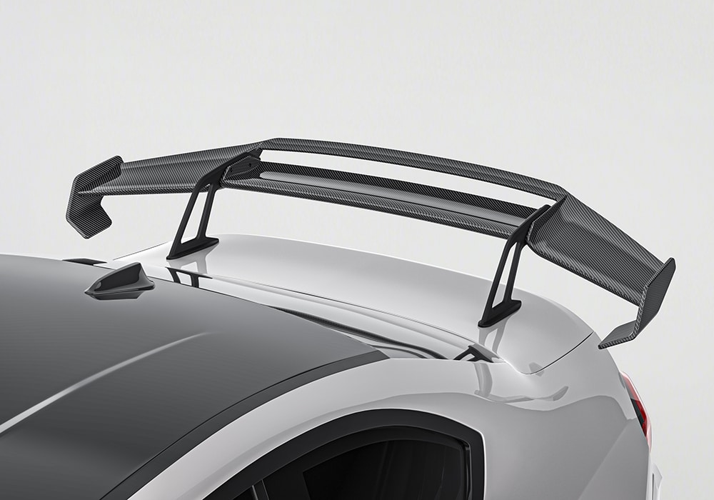 BMW M2 G87 fully equipped with the Carbon Fiber Aerodynamic Body Kit, highlighting the front splitters, side skirts, spoiler, and rear diffuser
