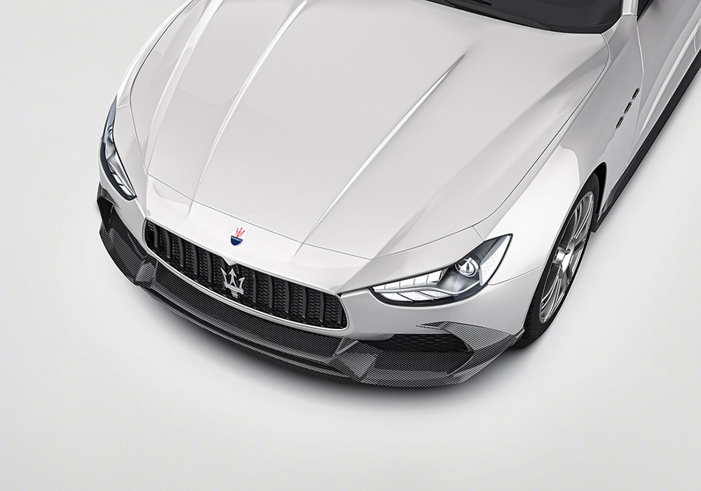 Maserati Ghibli featuring the Carbon Fiber Aerodynamics Kit, including carbon fiber front splitter, rear diffuser, and sleek side skirts