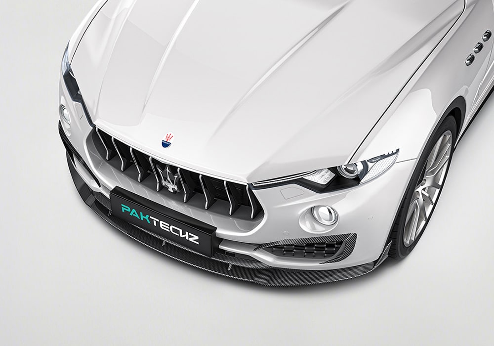 A comprehensive view of a Maserati Levante displaying the full Carbon Fiber Aerodynamics Kit, including spoilers, side skirts, and diffuser