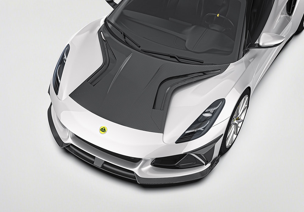 Lotus Emira fitted with a complete Carbon Fiber Aero Kit, enhancing its aerodynamic profile and bold styling
