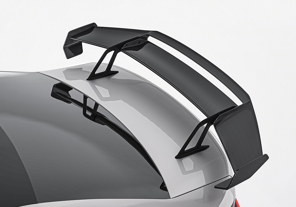 A full front and rear profile of the BMW M4 G82, showcasing the completed Carbon Fiber Aero Kit