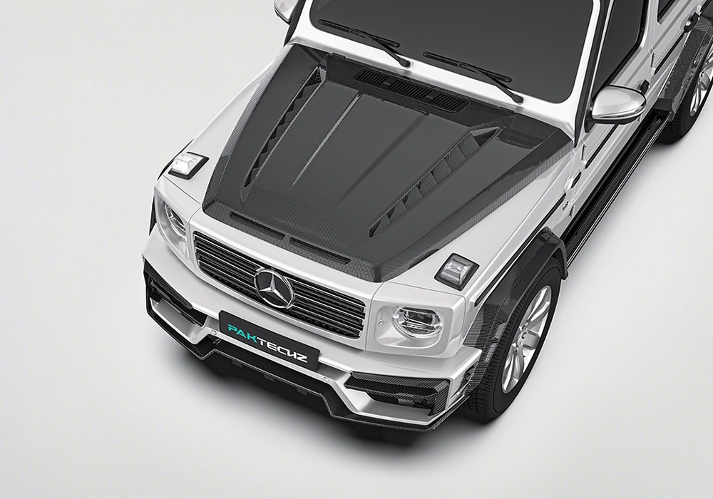 A frontal view of the G-Class W464 with the Carbon Fiber Front Splitter, emphasizing precision-crafted edges that enhance aerodynamics and aggressive styling