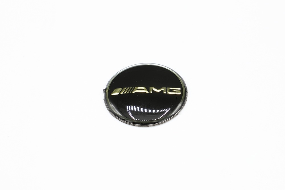 โลโก้ AMG ติดปุ่ม I-drive สีดำทอง