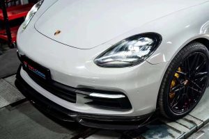 ลิ้นหน้า Carbon Fiber Porsche Panamera 971.1 RWD/Base/4/4S ทรง TAKD V1 Dry Carbon ปี 2017-2020