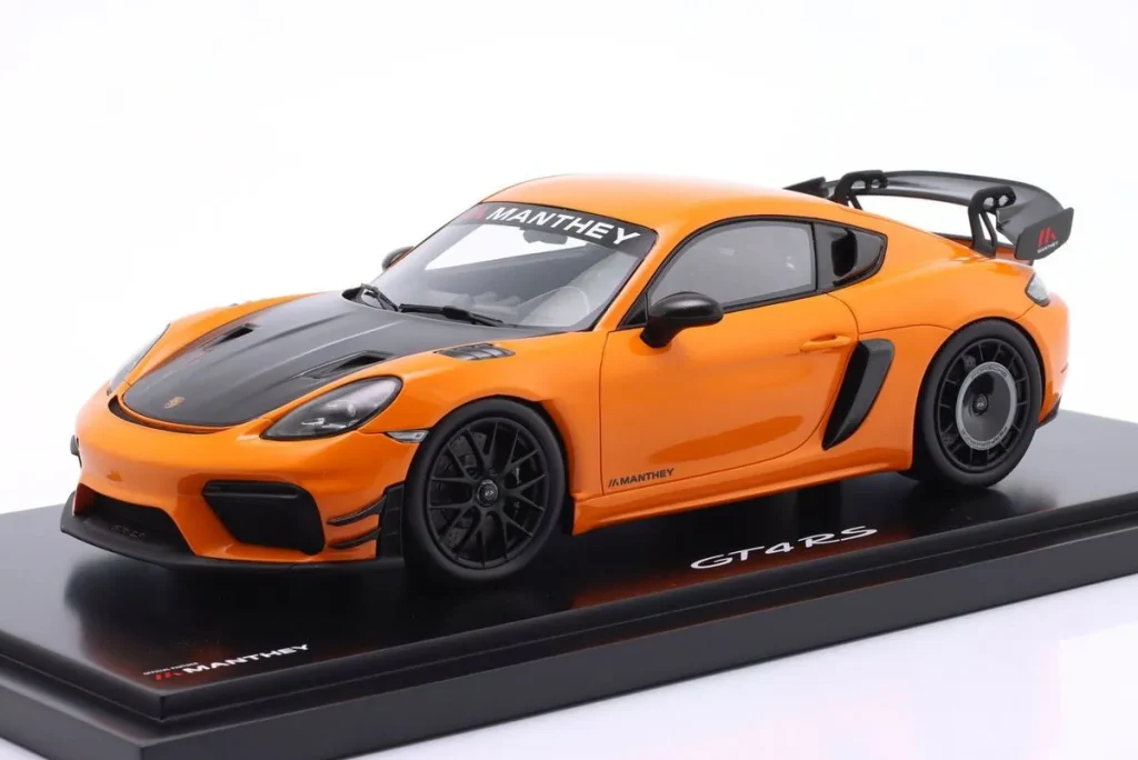 โมเดลรถ 1:18 Porsche 718 Cayman GT4 RS (982) Manthey Kit ปี 2024 สี pastell ส้ม Spark