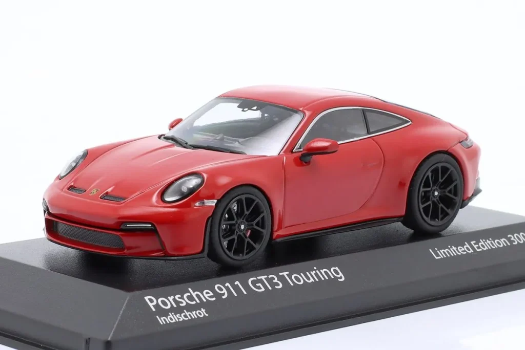 Model 1:43 Porsche 911 (992) GT3 Touring year 2021 Colour indisch red / Black Wheels Minichamps