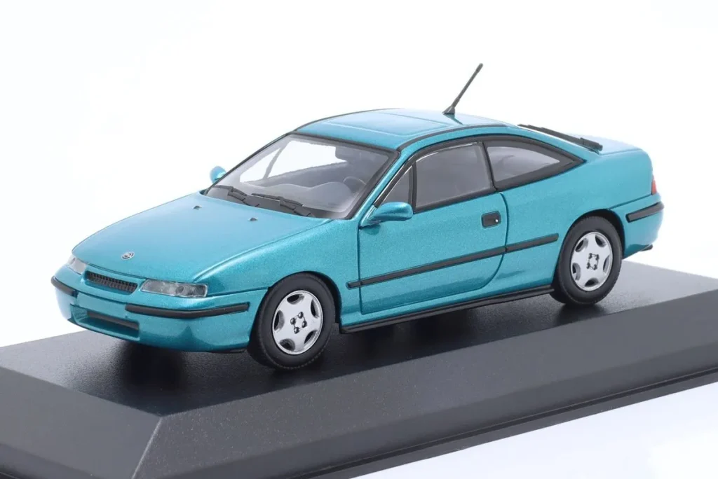 โมเดลรถ 1:43 Opel Calibra ปี 1989 สีเทอร์ควอยซ์เมทัลลิก Minichamps
