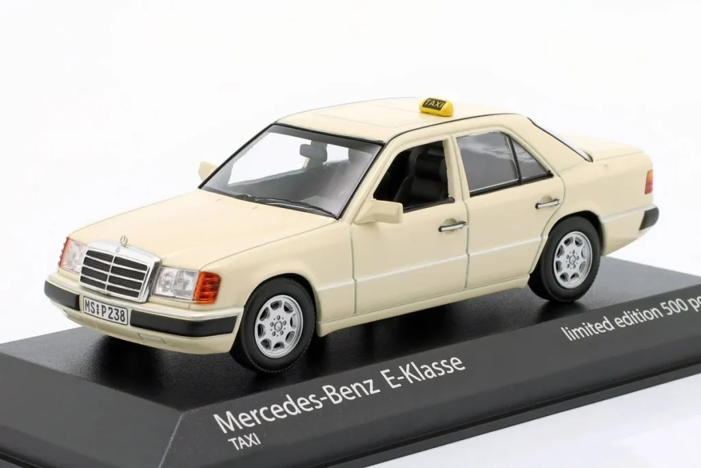 โมเดลรถ 1:43 Mercedes-Benz 230E (W124) Taxi Film “Tatort Münster” ปี 1990 สีงาช้างอ่อน Minichamps