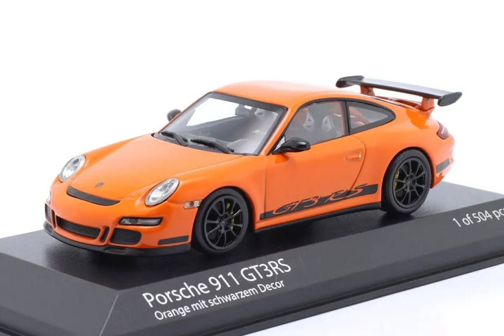 โมเดลรถ 1:43 Porsche 911 (997.1) GT3 RS ชุดสะสม Faszination Sportwagen ปี 2006 สีส้ม / ดำ ล้อ Minichamps