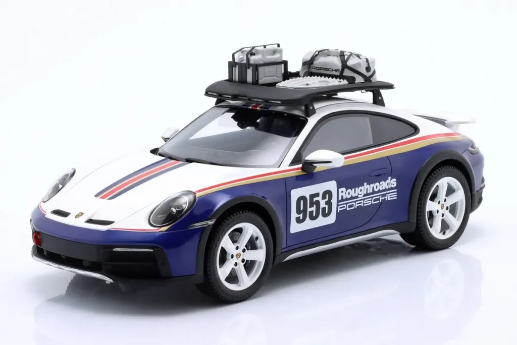 โมเดลรถ 1:18 Porsche 911 (992) Dakar #953 Roughroads แรลลี่ Design Paket สีน้ำเงิน / ขาว / แดง / ทอง (Roughroads Design) Spark