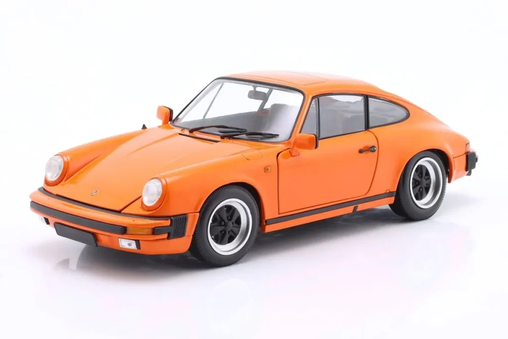 车型 1:18 Porsche 911 Carrera Coupe 3.2 年 1983 橙色 Minichamps