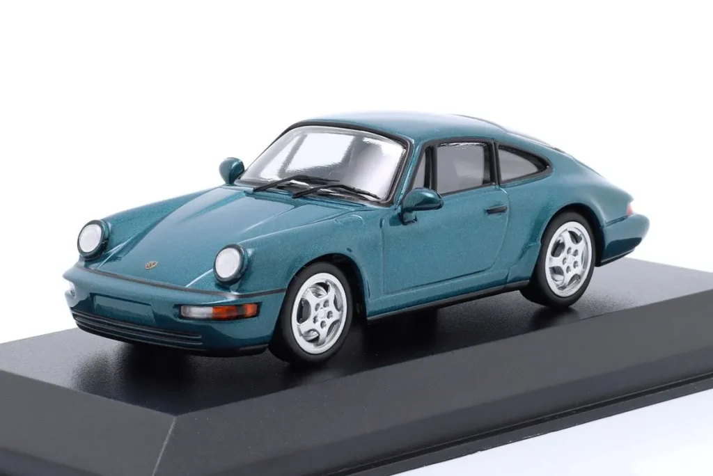โมเดลรถ 1:43 Porsche 911 (964) Carrera 2 ปี 1989 สีเทอร์ควอยซ์เมทัลลิก Minichamps