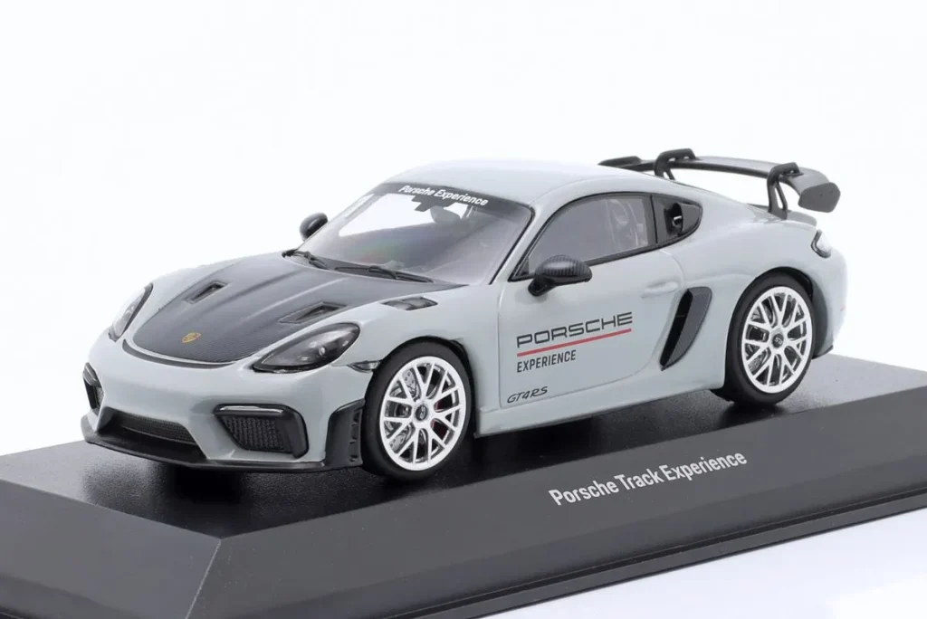 โมเดลรถ 1:43 Porsche Cayman 718 (982) GT4 RS Track Experience สีเทา / ดำ Minichamps
