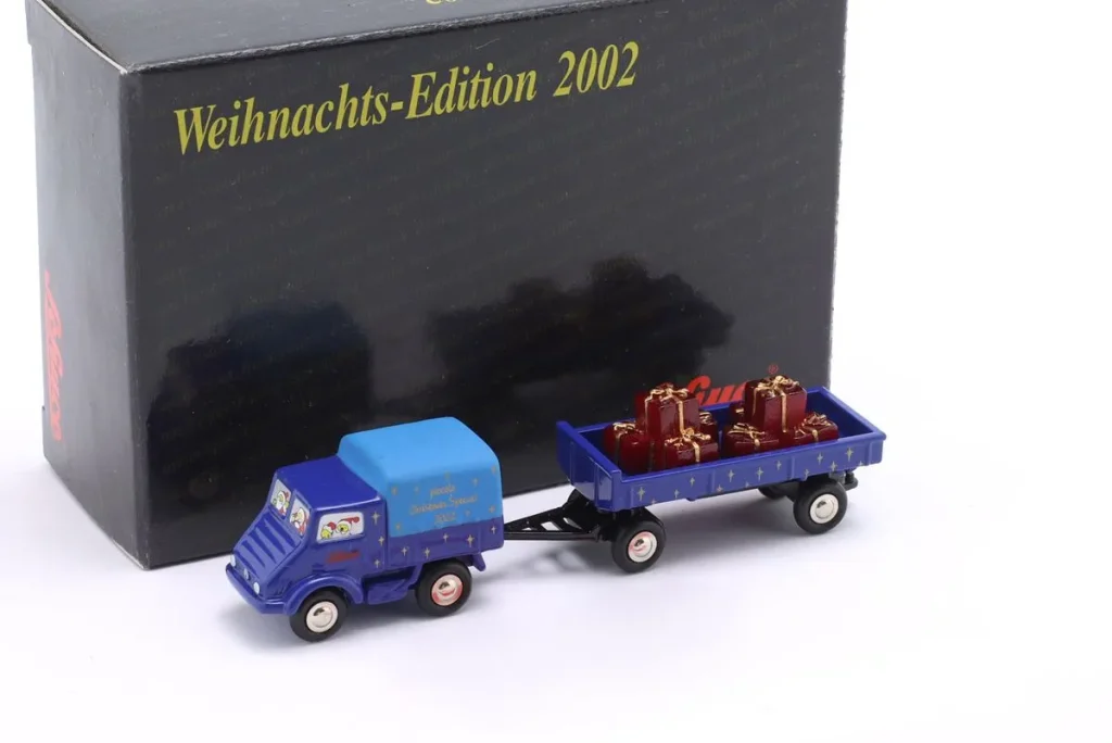 โมเดลรถ 1:90 Unimog 401 ปี 2002 สีน้ำเงิน Schuco