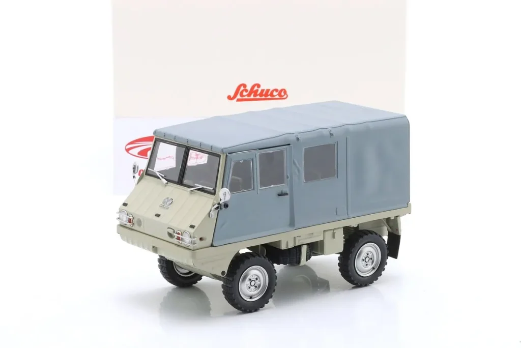 โมเดลรถ 1:18 Steyr-Puch Haflinger 4×4 Large Roof สีเบจ / เทา Schuco