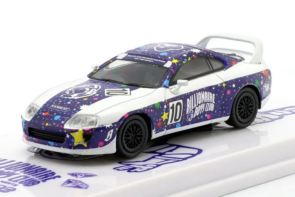 โมเดลรถ 1:64 Toyota Supra #10 “Billionaire Boys Club” ปี 1993 สีขาว / ม่วง พร้อม Dekor Tarmac Works