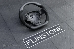 พวงมาลัย Carbon fiber สำหรับ Aston Martin Vantage 2010 หนังดำ ด้ายดำ