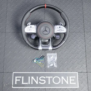 ต้องขัดคราบกาวออกก่อน พวงมาลัย Carbon fiber หนังดำ ด้ายแดง กรอบเงิน พร้อม Drive Unit สำหรับ W205 C-Class