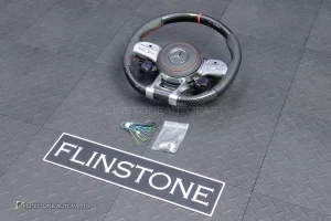 ต้องขัดคราบกาวออกก่อน พวงมาลัย Carbon fiber หนังดำ ด้ายแดง กรอบเงิน พร้อม Drive Unit สำหรับ W205 C-Class