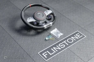 ต้องขัดคราบกาวออกก่อน พวงมาลัย Carbon fiber หนังดำ ด้ายแดง กรอบเงิน พร้อม Drive Unit สำหรับ W205 C-Class