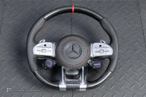 ต้องขัดคราบกาวออกก่อน พวงมาลัย Carbon fiber หนังดำ ด้ายแดง กรอบเงิน พร้อม Drive Unit สำหรับ W205 C-Class