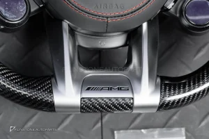 ต้องขัดคราบกาวออกก่อน พวงมาลัย Carbon fiber หนังดำ ด้ายแดง กรอบเงิน พร้อม Drive Unit สำหรับ W205 C-Class