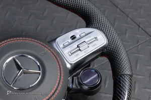 ต้องขัดคราบกาวออกก่อน พวงมาลัย Carbon fiber หนังดำ ด้ายแดง กรอบเงิน พร้อม Drive Unit สำหรับ W205 C-Class