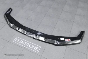 ลิ้นหน้า สำหรับ BMW G70 Series 7 ทรง Maxton design สีดำเงา