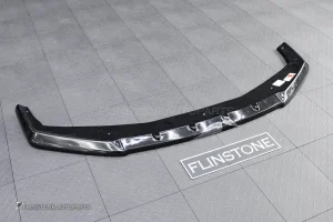 ลิ้นหน้า สำหรับ BMW G70 Series 7 ทรง Maxton design สีดำเงา