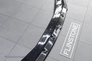 ลิ้นหน้า สำหรับ BMW G70 Series 7 ทรง Maxton design สีดำเงา