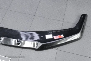 ลิ้นหน้า สำหรับ BMW G70 Series 7 ทรง Maxton design สีดำเงา