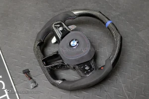 พวงมาลัย พร้อม Airbag สำหรับ BMW G70 Sereis 7 หนัง Alcantara ดำ ด้
