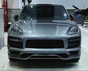 ชุดลิ้นหน้า-หลัง + โป่งซุ้มล้อ + แผงประตู + กันชนกลางหลัง + สเกิร์ตข้าง PORSCHE Cayenne 9Y0.1 ปี 18-23 อัพเกรดรุ่นล่างเป็นรุ่นท็อป ทรง Turbo + GTS + TKT + SD Coupe by KM