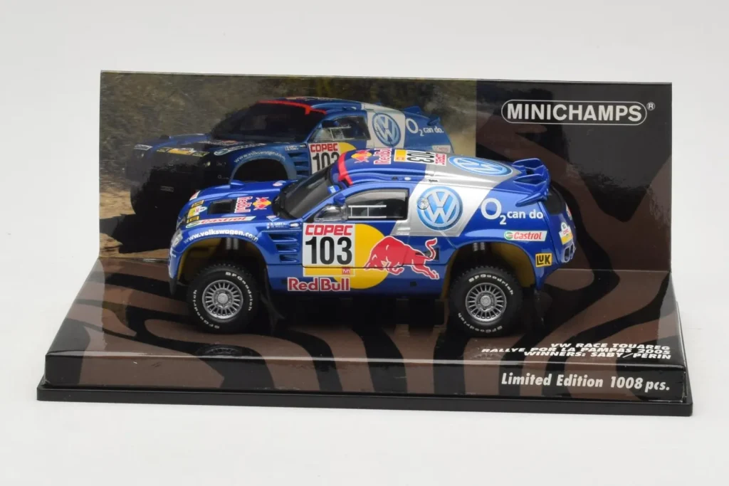 โมเดลรถ 1:43 Volkswagen Race Touareg #103 B. Saby / R. Perin Winner Rally Por Las Pampas ปี 2005 Minichamps (มือสอง)