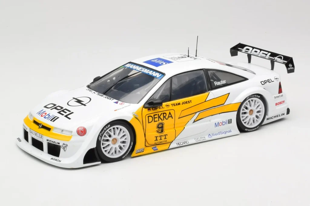โมเดลรถ 1:18 Opel Calibra V6 #9 M. Reuter DTM ปี 1995 UT Models (มือสอง)