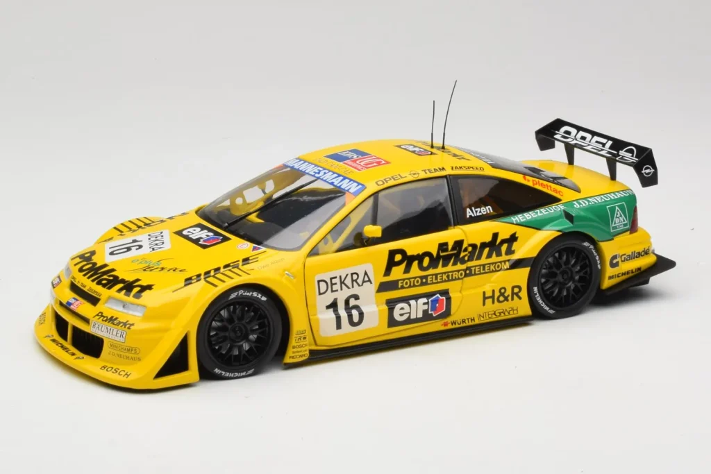 โมเดลรถ 1:18 Opel Calibra V6 4×4 #16 U. Alzen DTM ปี 1996 UT Models (มือสอง)