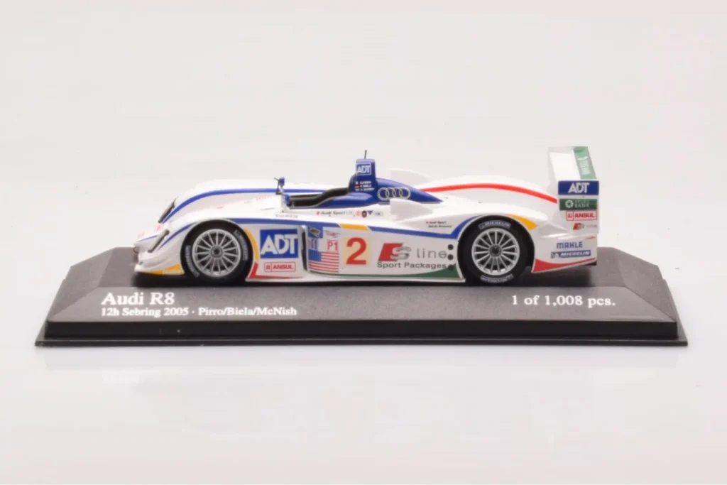 โมเดลรถ 1:43 Audi R8 #2 E. Pirro / F. Biela / A. McNish 12 Hours of Sebring 2nd Place ปี 2005 Minichamps (มือสอง)