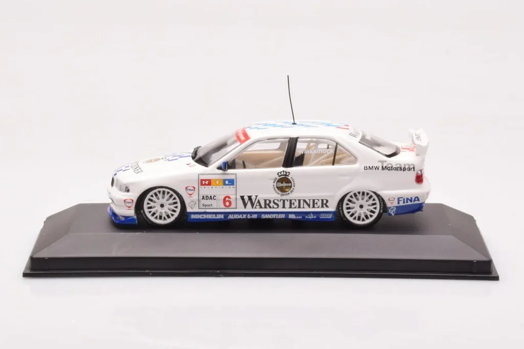 โมเดลรถ 1:43 BMW 320i E36 #6 Bigazzi M. Winkelhock STW ปี 1997 Minichamps (มือสอง)