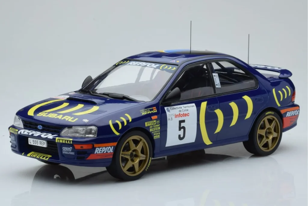 โมเดลรถ 1:18 Subaru Impreza 555 #5 C. Sainz / L. Moya Tour de Corse ปี 1995 IXO