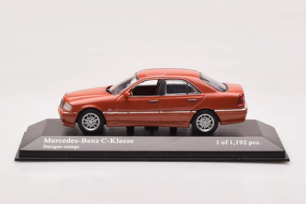 โมเดลรถ 1:43 Mercedes C-Class W202 C240 สีส้มเมทัลลิก Minichamps (มือสอง)