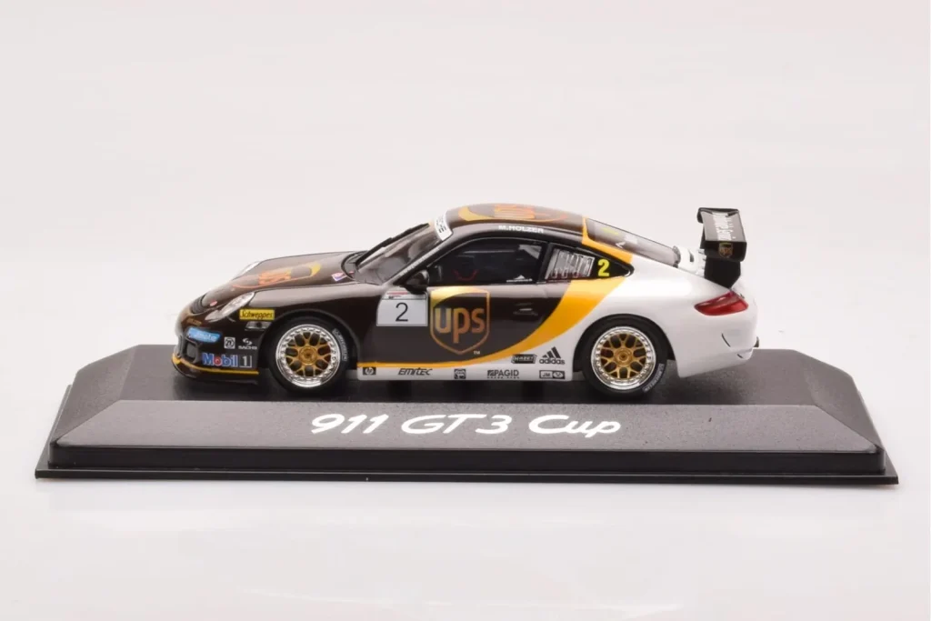 โมเดลรถ 1:43 Porsche 911 997 GT3 Cup #2 UPS Holzer ปี 2008 Minichamps (มือสอง)