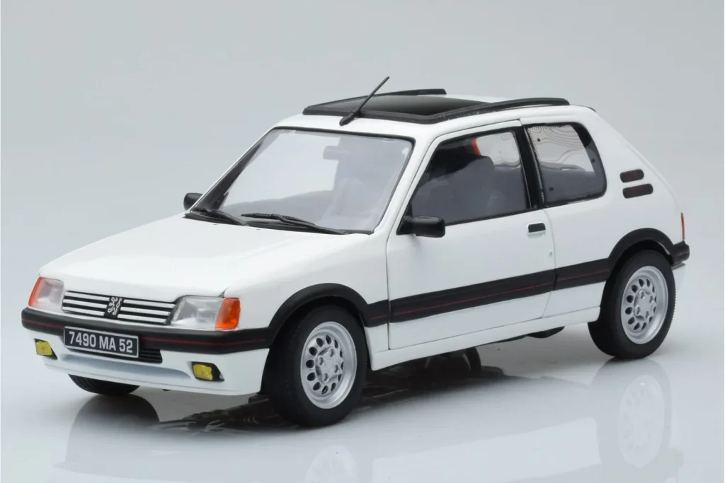 โมเดลรถ 1:18 Peugeot 205 GTi 1.6 สีขาว Norev