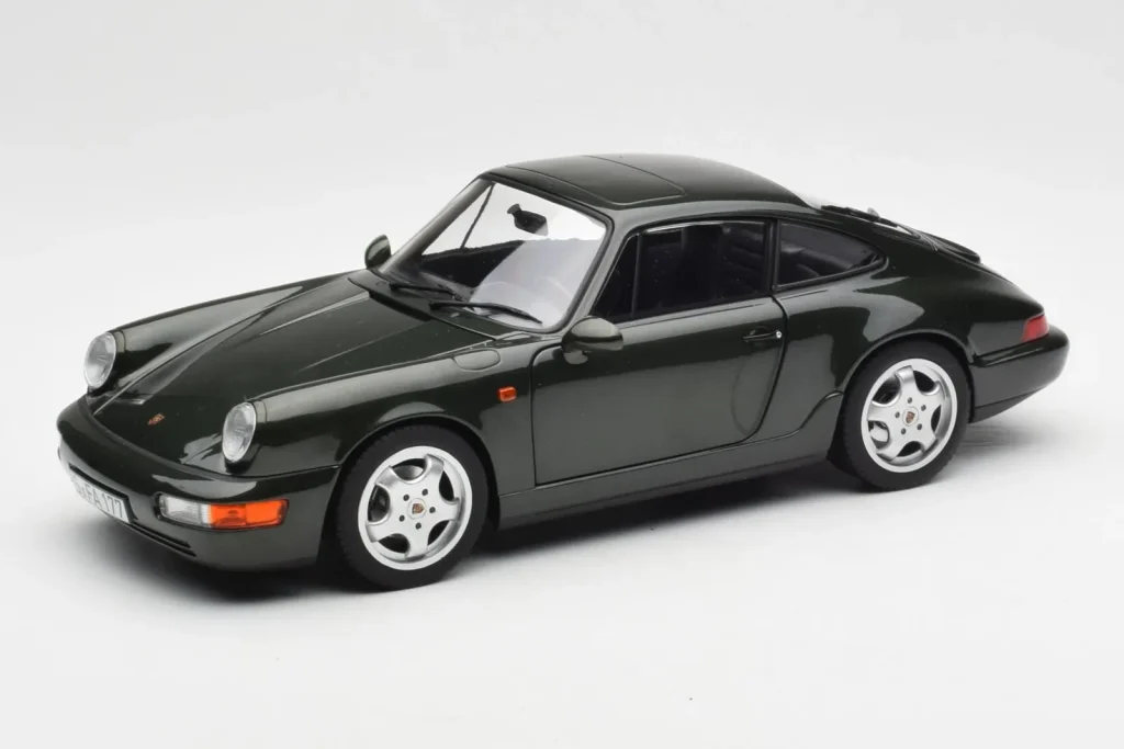 โมเดลรถ 1:18 Porsche 911 964 Carrera 4 สีเขียวเมทัลลิก Norev (มือสอง)