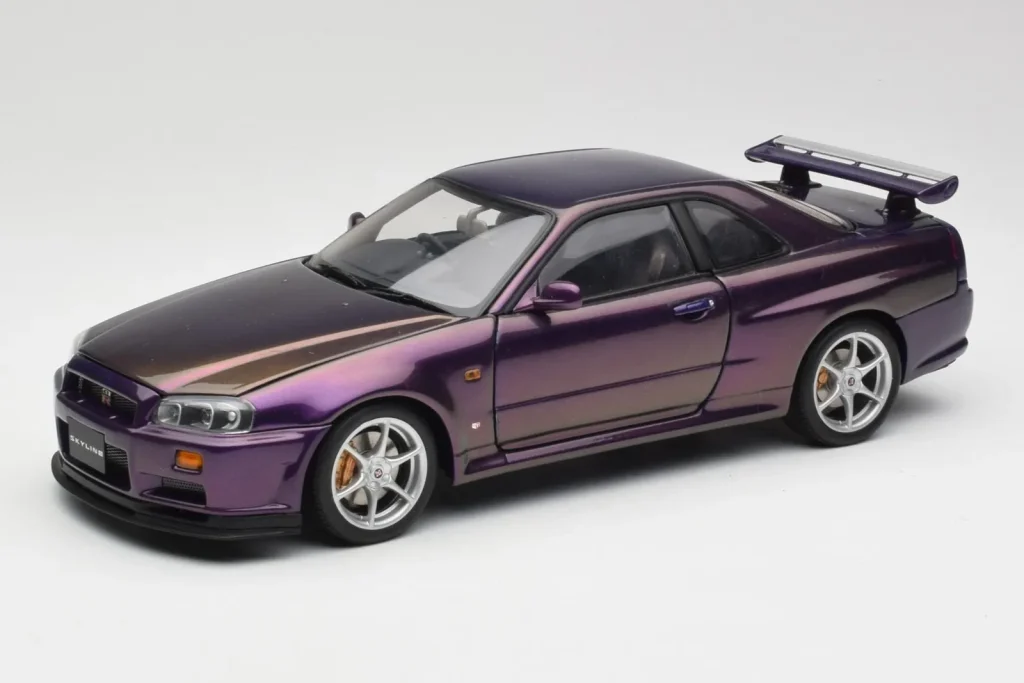 โมเดลรถ 1:18 Nissan Skyline GT-R R34 V-Spec Midnight สีม่วง AUTOart (มือสอง)